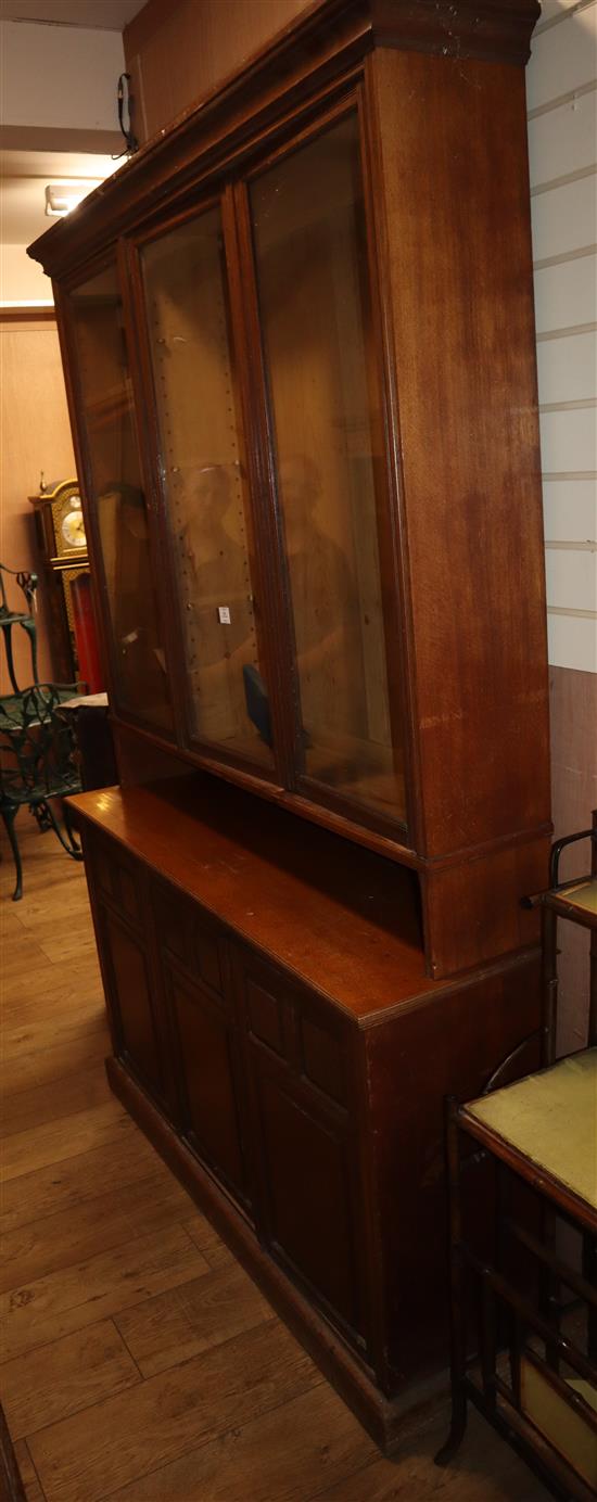An Edwardian fielded panelled oak dresser, with glazed upper section W.148cm